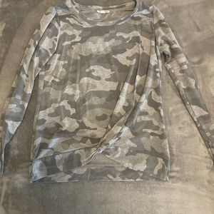 Grey colored camouflage shirt with knot on front. Price negotiable